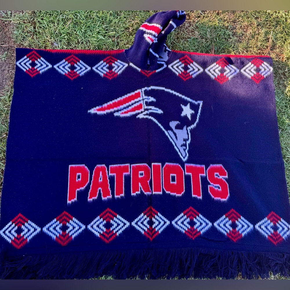 Patrios sports Alpaca wool blend poncho. Hooded unisex one size fits most